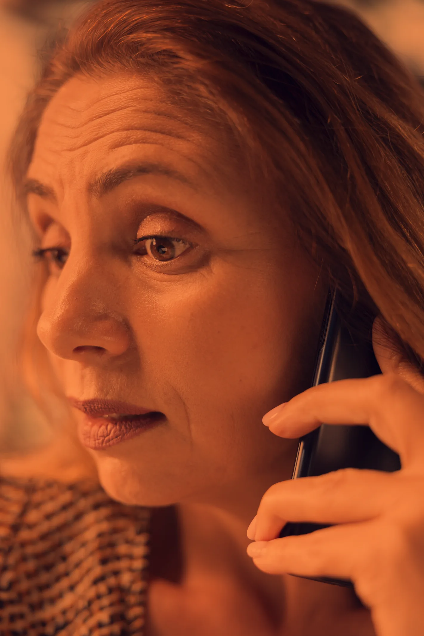 A woman speaking on the phone