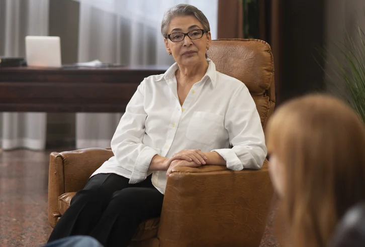 A counsellor talking with a young person